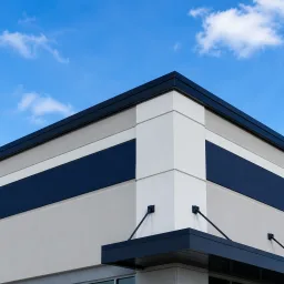 Restored commercial building roofline with clean facade